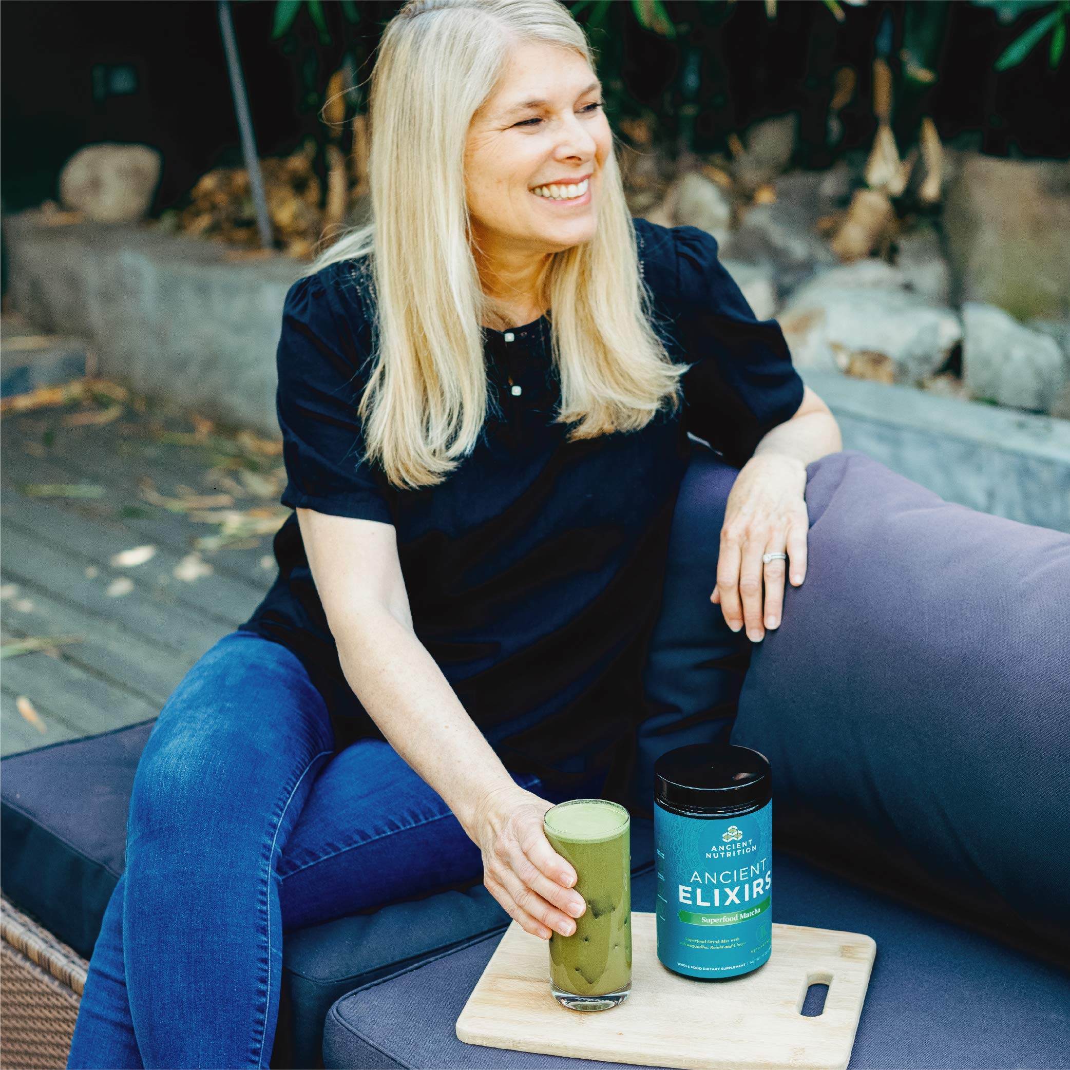 Ancient Nutrition ingredients overlay showcases coconuts, green tea, and adaptogens
