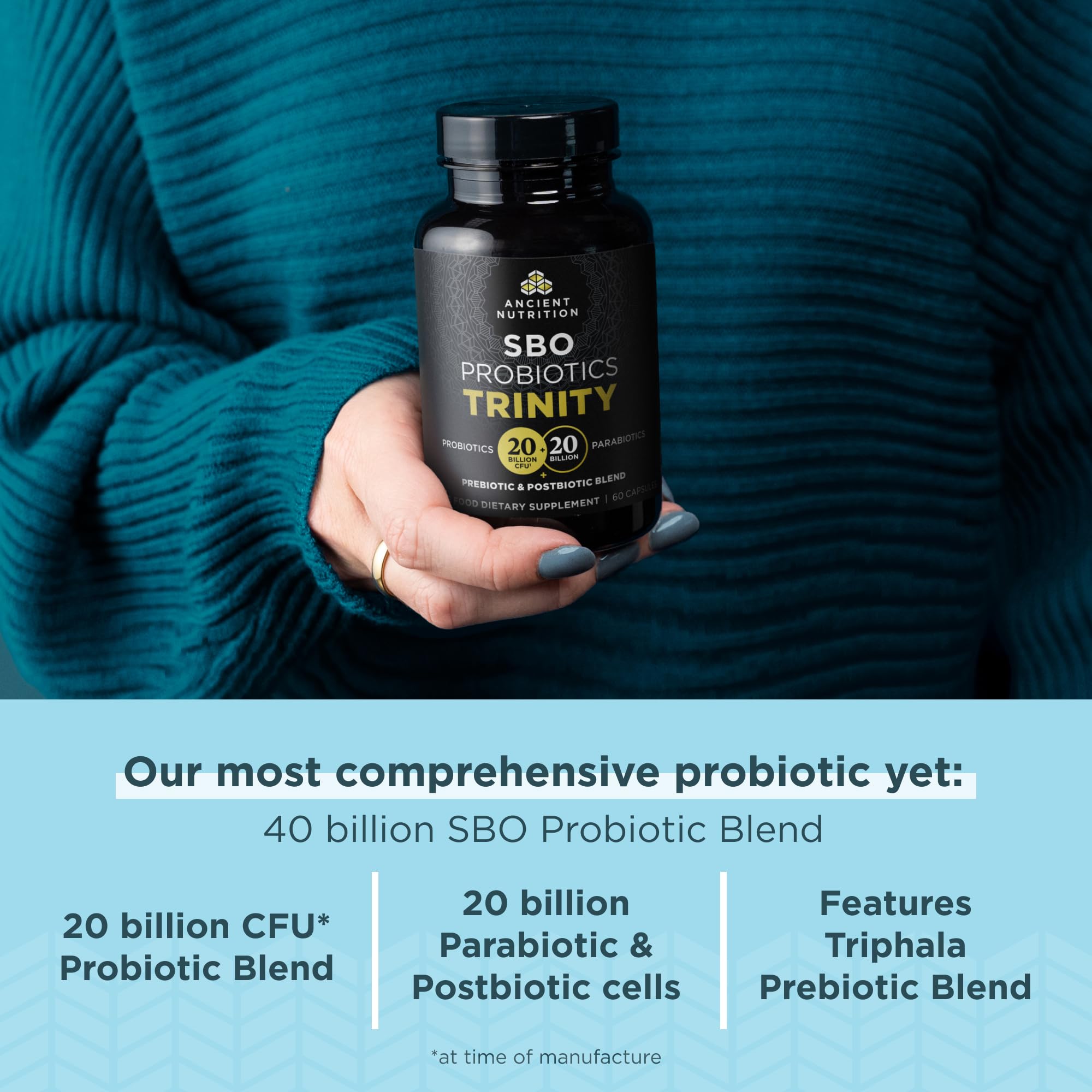 Capsules being poured from Ancient Nutrition SBO Probiotic Trinity bottle.