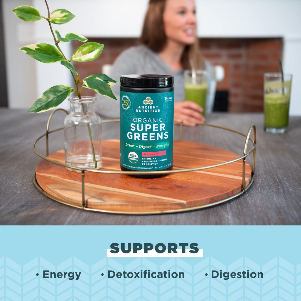 Ancient Nutrition SuperGreens organic ingredients label shows greens, fruits, and enzymes.
