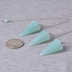 Angelstones blue amazonite pendulum closeup highlighting natural texture for refined energy work