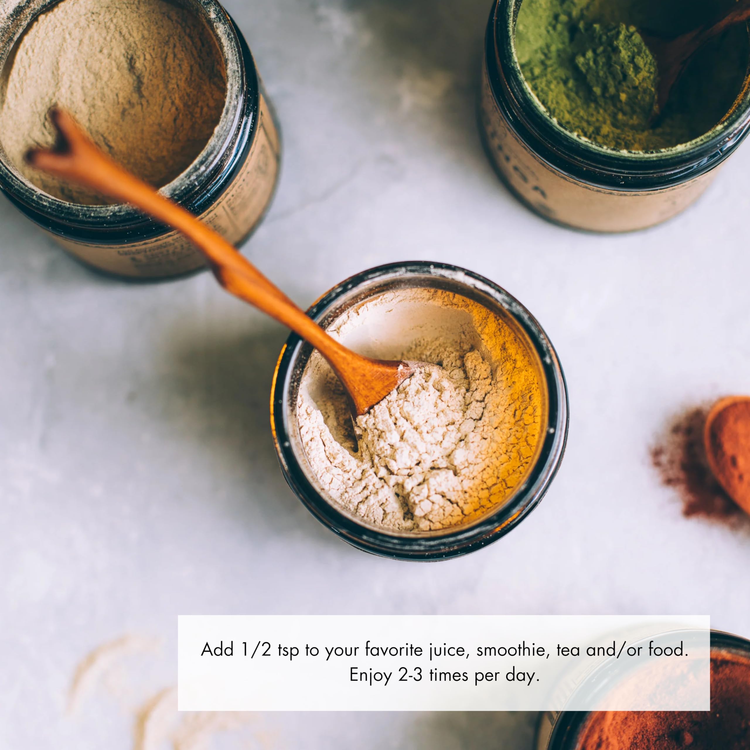 Anima Mundi Ashwagandha powder scoop in a bowl ready for tea or smoothie.