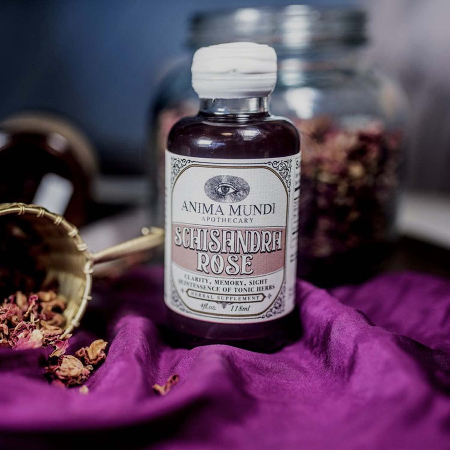 Anima Mundi Elixir pouring image for versatile use in tea or soups.