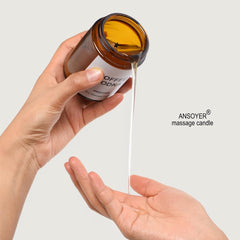 ANSOYER candle melts into nourishing oil for skin hydration.