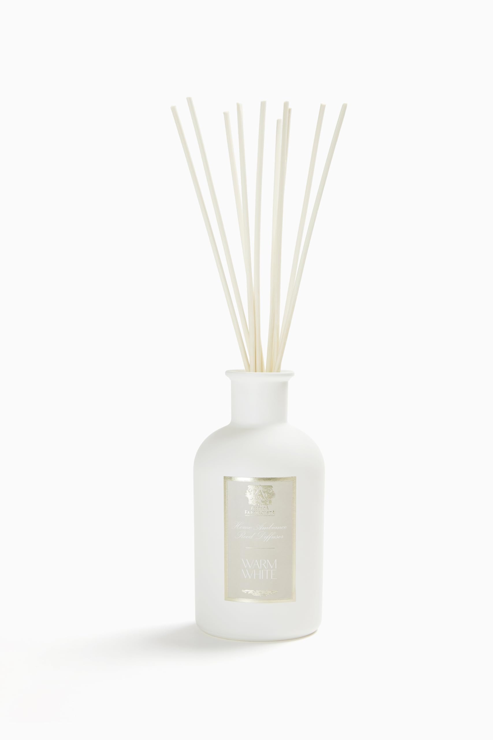Antica Farmacista Home Ambiance Diffuser bottle and reeds delivering long-lasting scent.