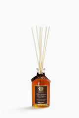 Antica Farmacista Home Ambiance Diffuser bottle releasing vanilla, bourbon and mandarin scent for inviting rooms.