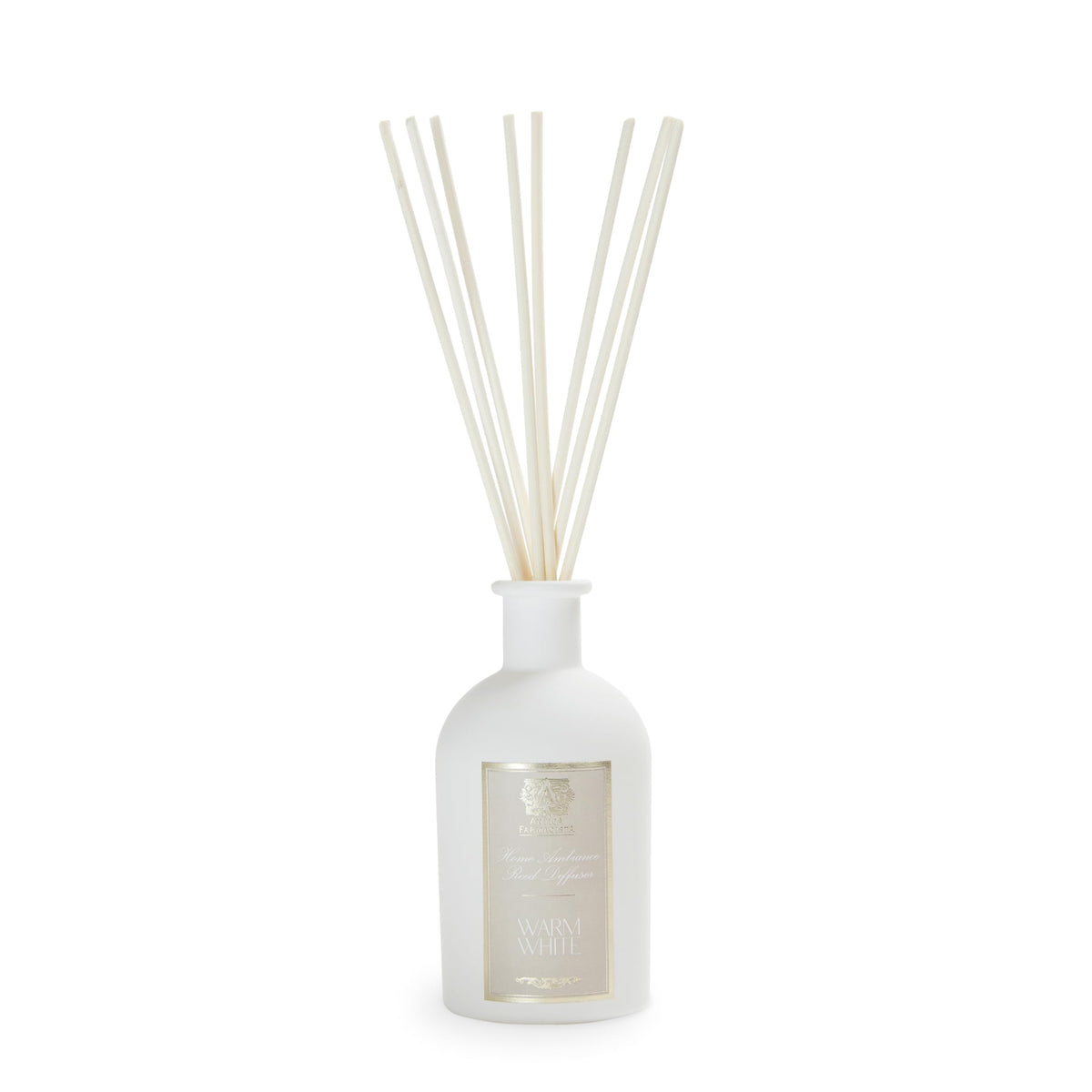 Antica Farmacista warm white diffuser bottle creating a cozy, inviting room.