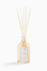 Antica Farmacista diffuser bottle showcasing pink peony and citron for elegant room ambiance.