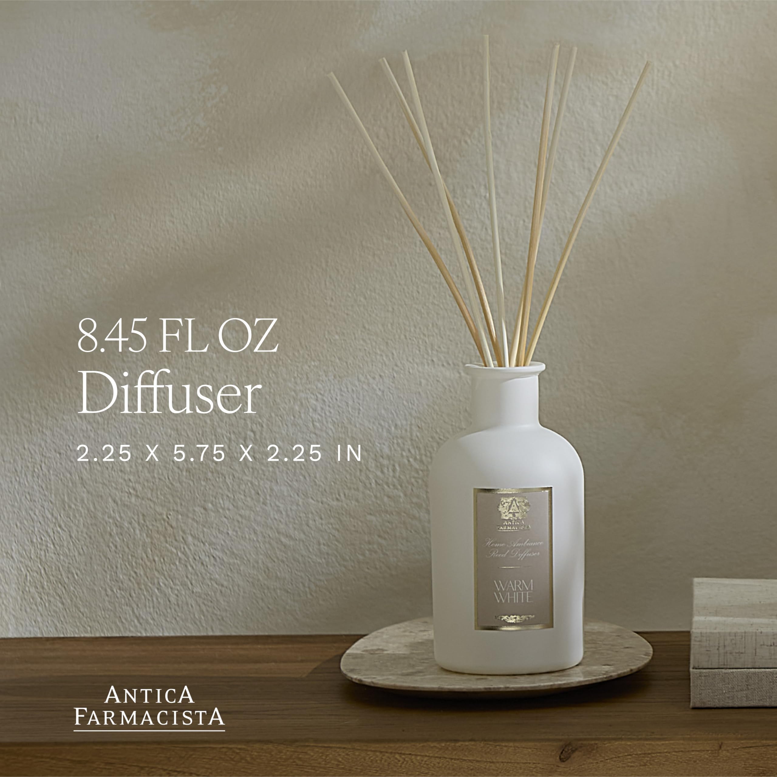 Antica Farmacista reed diffuser closeup with signature reeds dispersing fragrance.