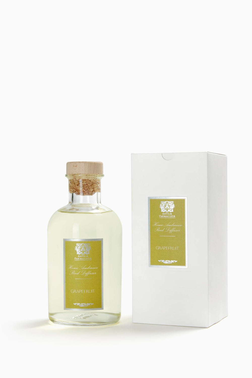 Antica Farmacista signature reeds fill the room with enduring fragrance.