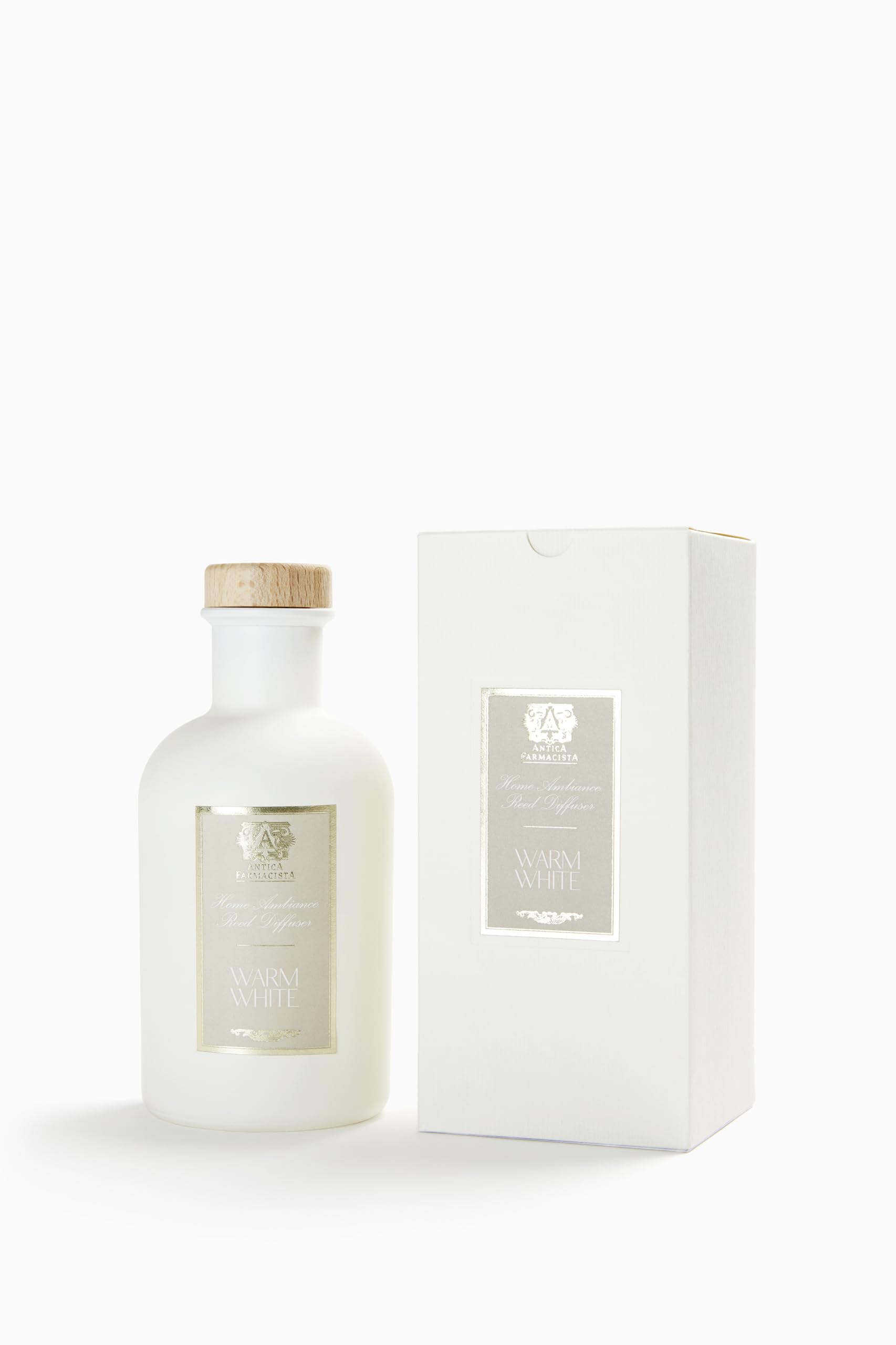 Antica Farmacista Warm White diffuser in a room creates a soft, inviting glow.