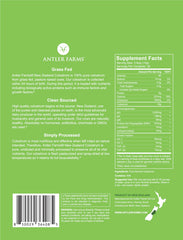 Antler Farms colostrum powder scoop highlighting easy daily dosing.