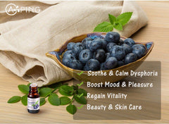AOPING Blueberry essential oil pour action, releasing a berry scent for home fragrance projects.