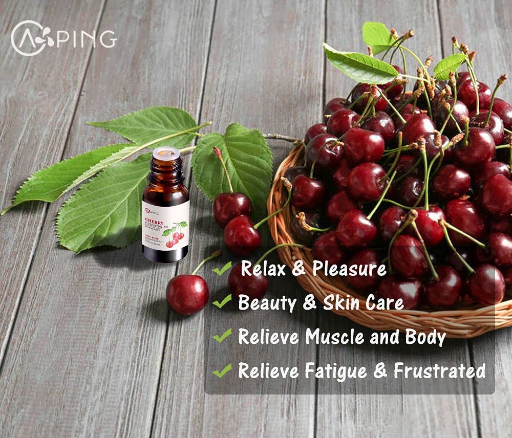 AOPING Cherry Essential Oil label emphasizes premium grade and safety.