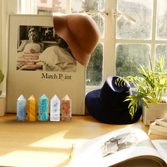 Apengshi Amazonite tower in-hand demonstrates portable decor piece.