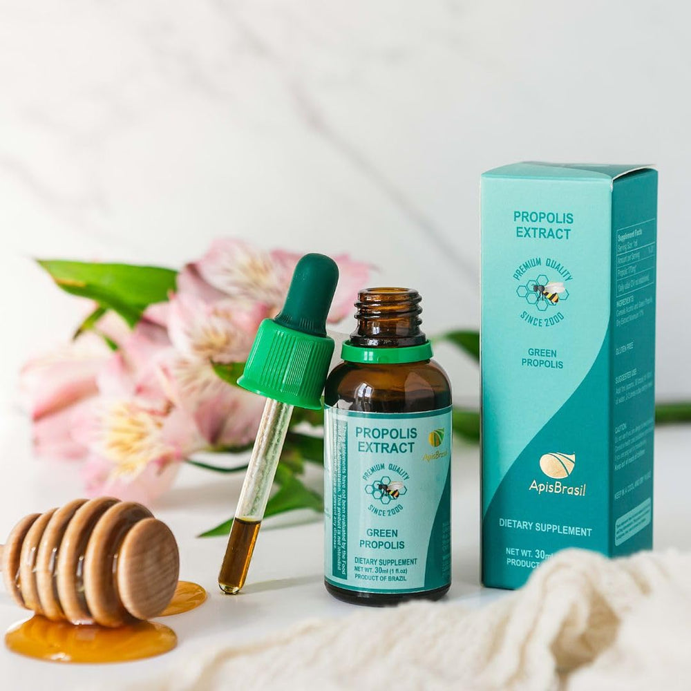 ApisBrasil Green Propolis liquid extract drops in dropper for easy beverage mixing.