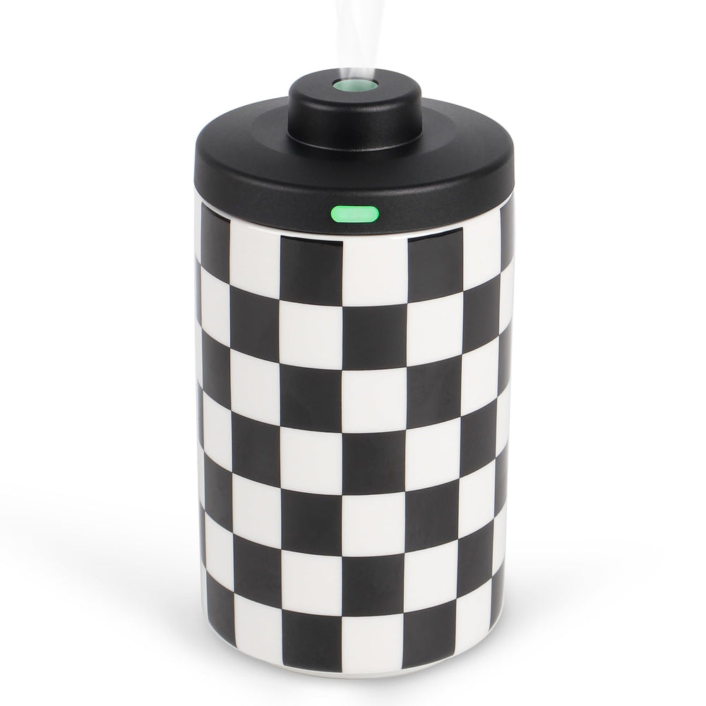 APOMATOT waterless diffuser with a compact ceramic body, ideal for home fragrance.