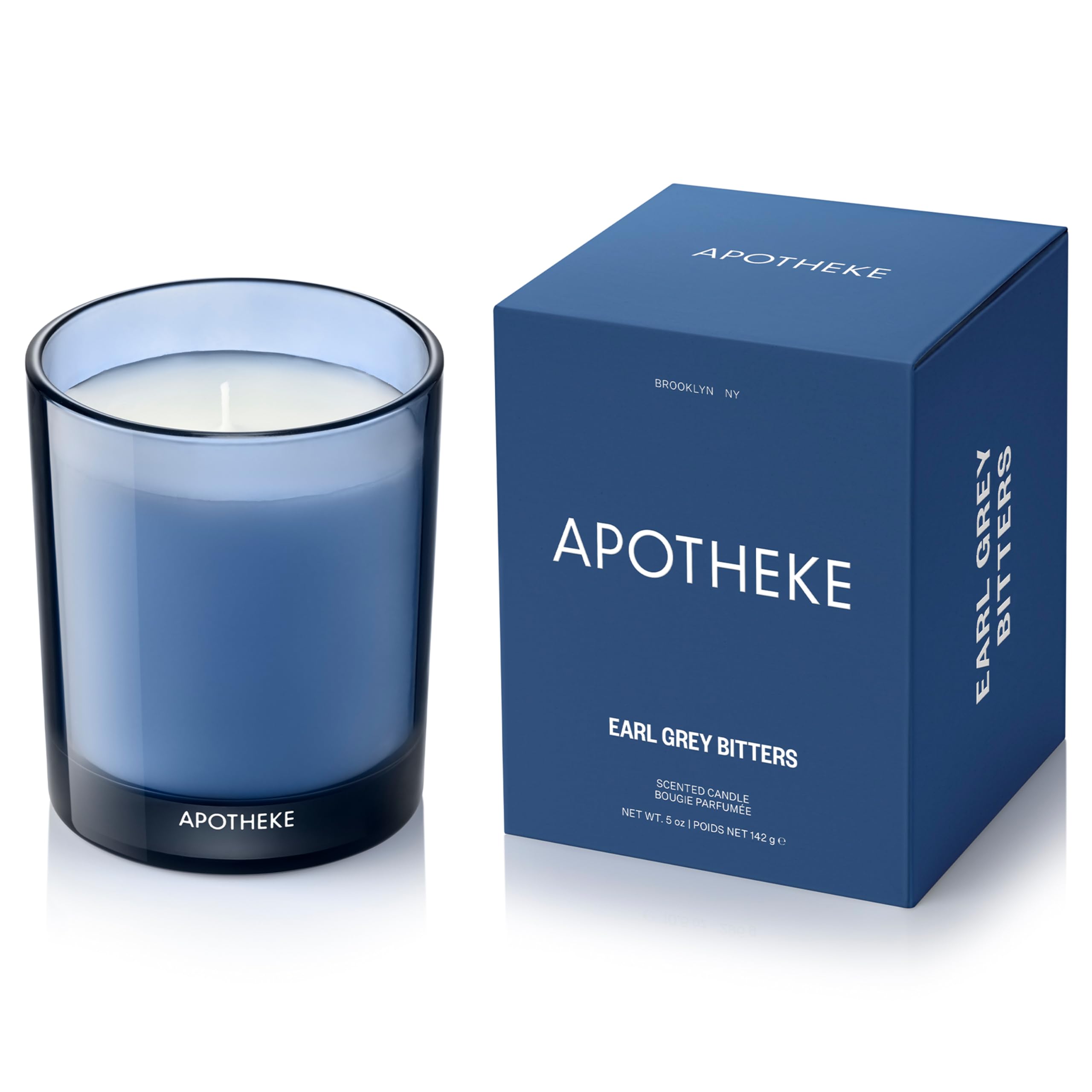 APOTHEKE Earl Grey Bitters candle jar close-up for long-lasting fragrance in living spaces.