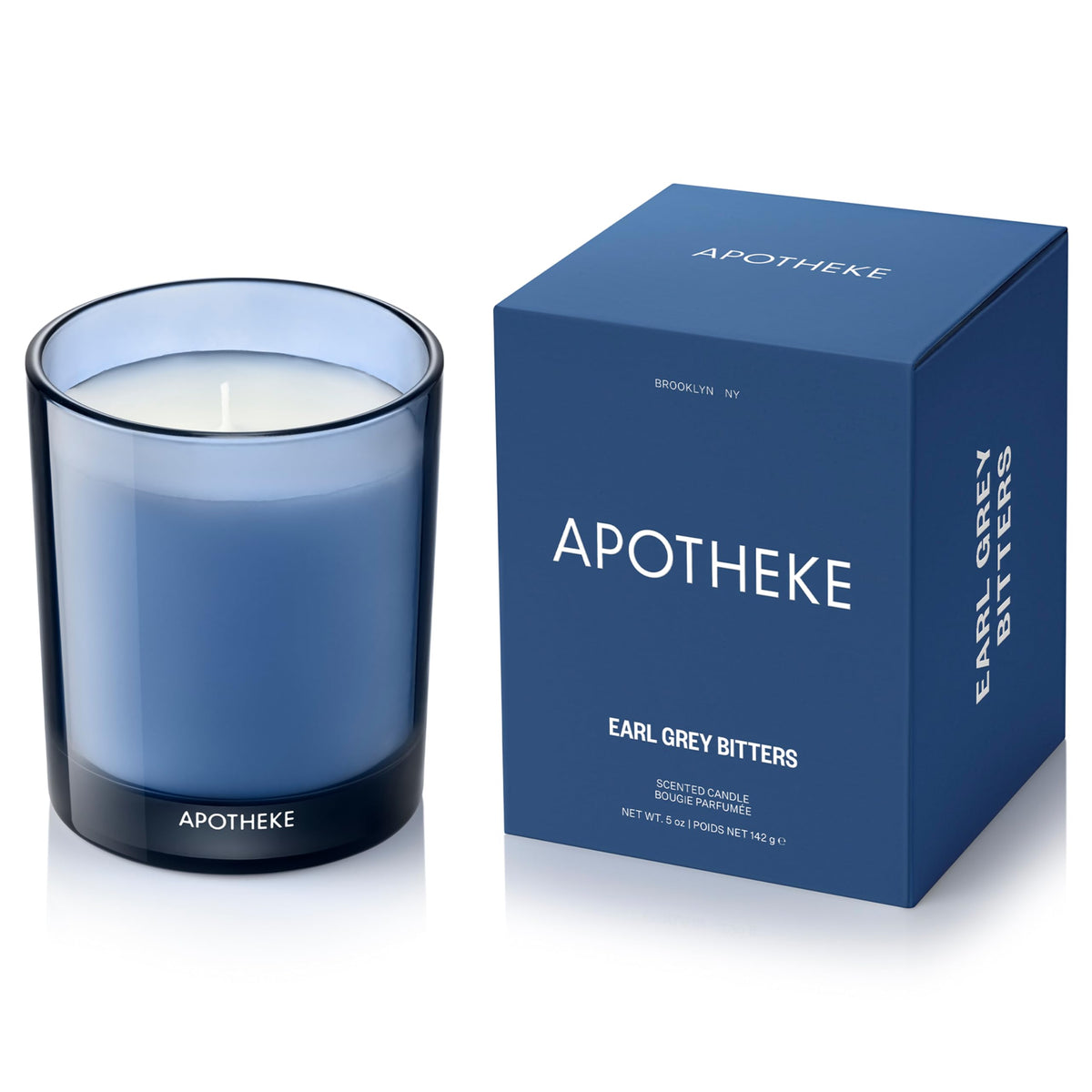 APOTHEKE Earl Grey Bitters candle jar close-up for long-lasting fragrance in living spaces.