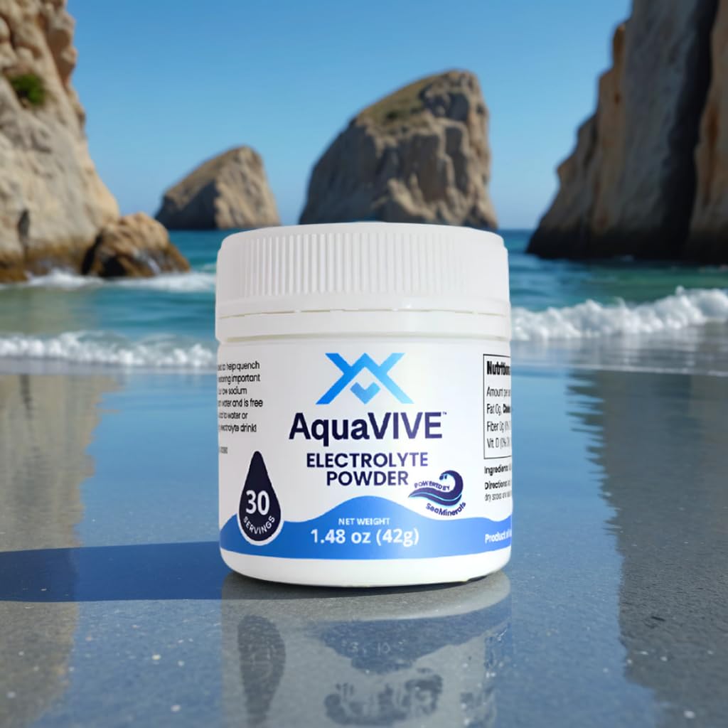 A glass with AquaVIVE zero sugar electrolyte mix poured over ice.