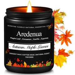Aredenua Autumn Leaves candle in amber jar adds cozy atmosphere.