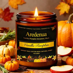 Aredenua Vanilla Pumpkin Candle jar glows warmly for cozy Christmas ambiance.