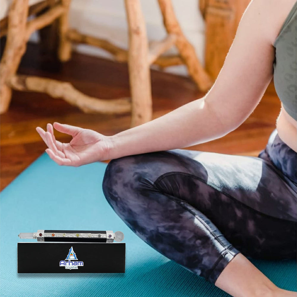 ARHAM CRYSTAL meditation Reiki wand in use during practice