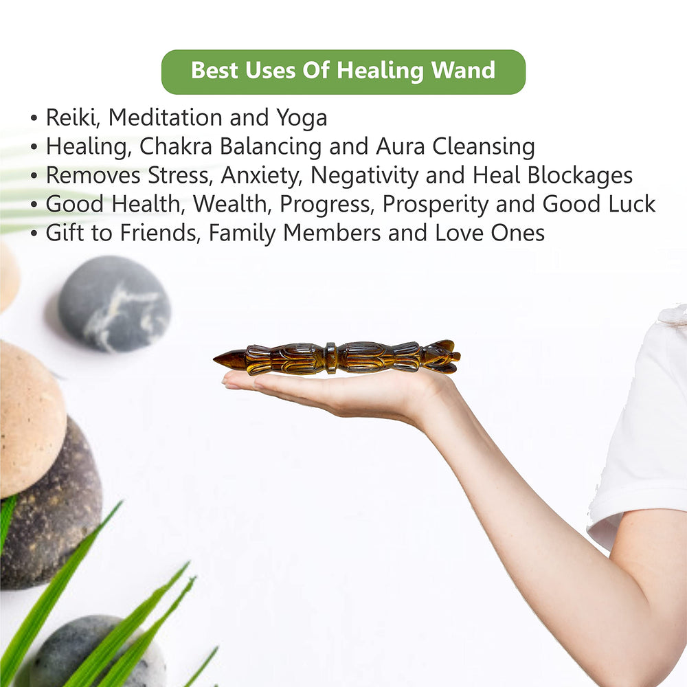 ARHAM CRYSTAL Tiger Eye wand during aura cleansing ritual.