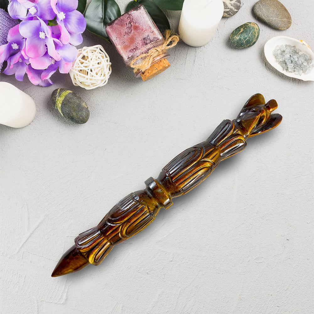 ARHAM CRYSTAL Tiger Eye wand hand carved with detailed craftsmanship for mindful practice.