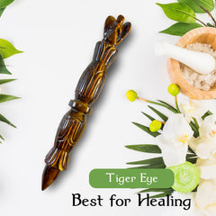 ARHAM CRYSTAL Tiger Eye wand in meditation setup to support chakra alignment.