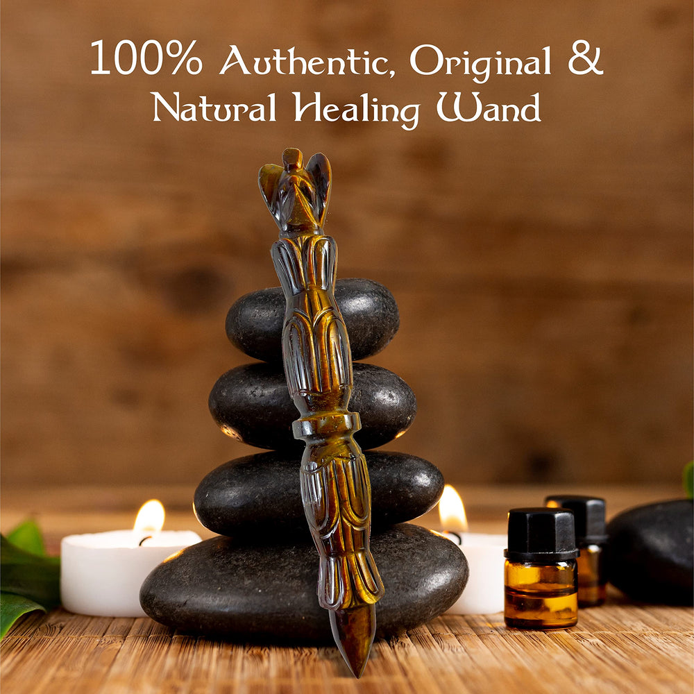 ARHAM CRYSTAL Tiger Eye wand used for Reiki sessions and energy work.