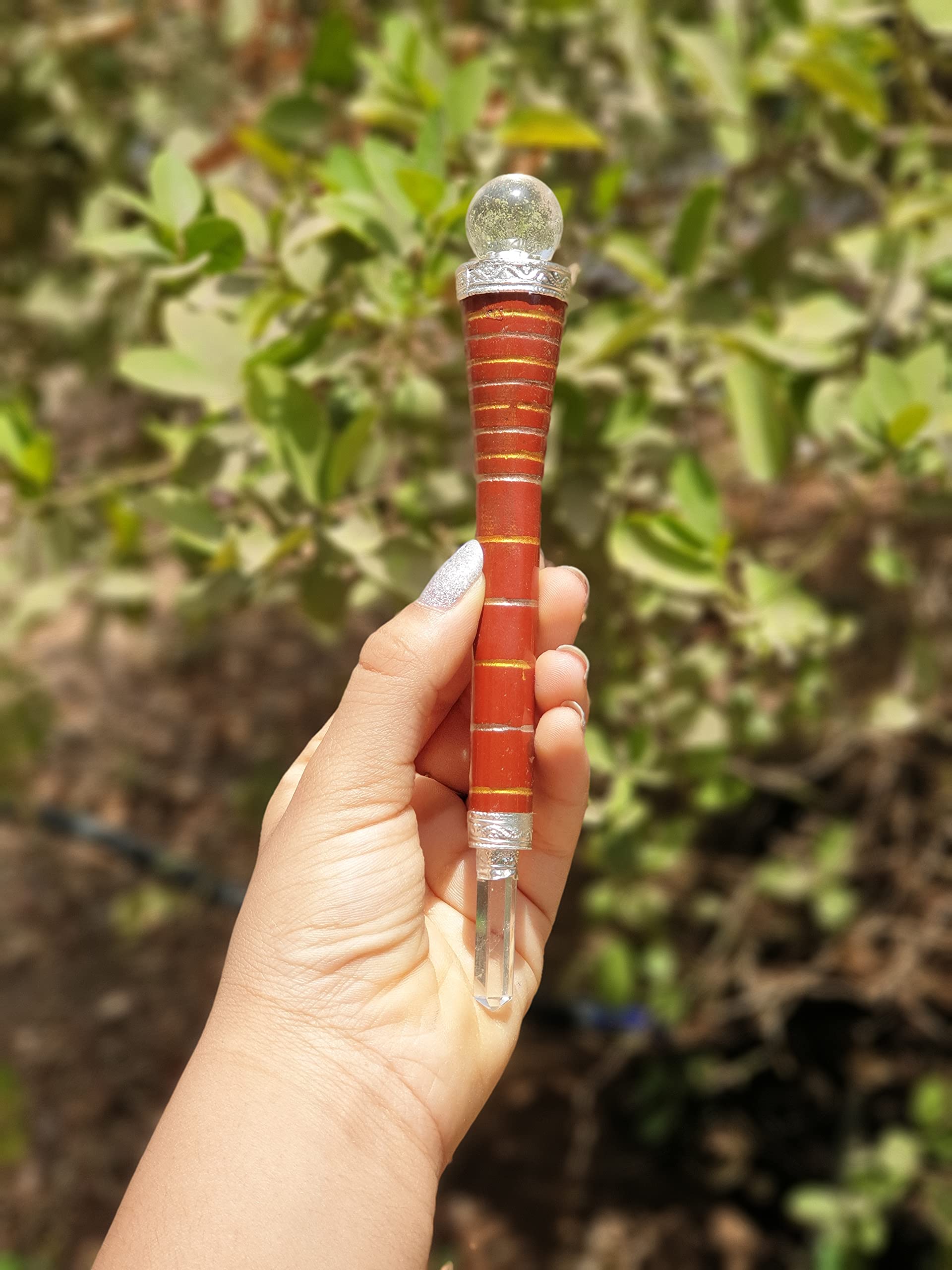 Arham Crystal wooden wand helps meditation and chakra alignment during practice.