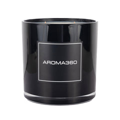 Aroma360 Black Velvet 4-Wick Candle on a chic table adds warm ambiance for living spaces