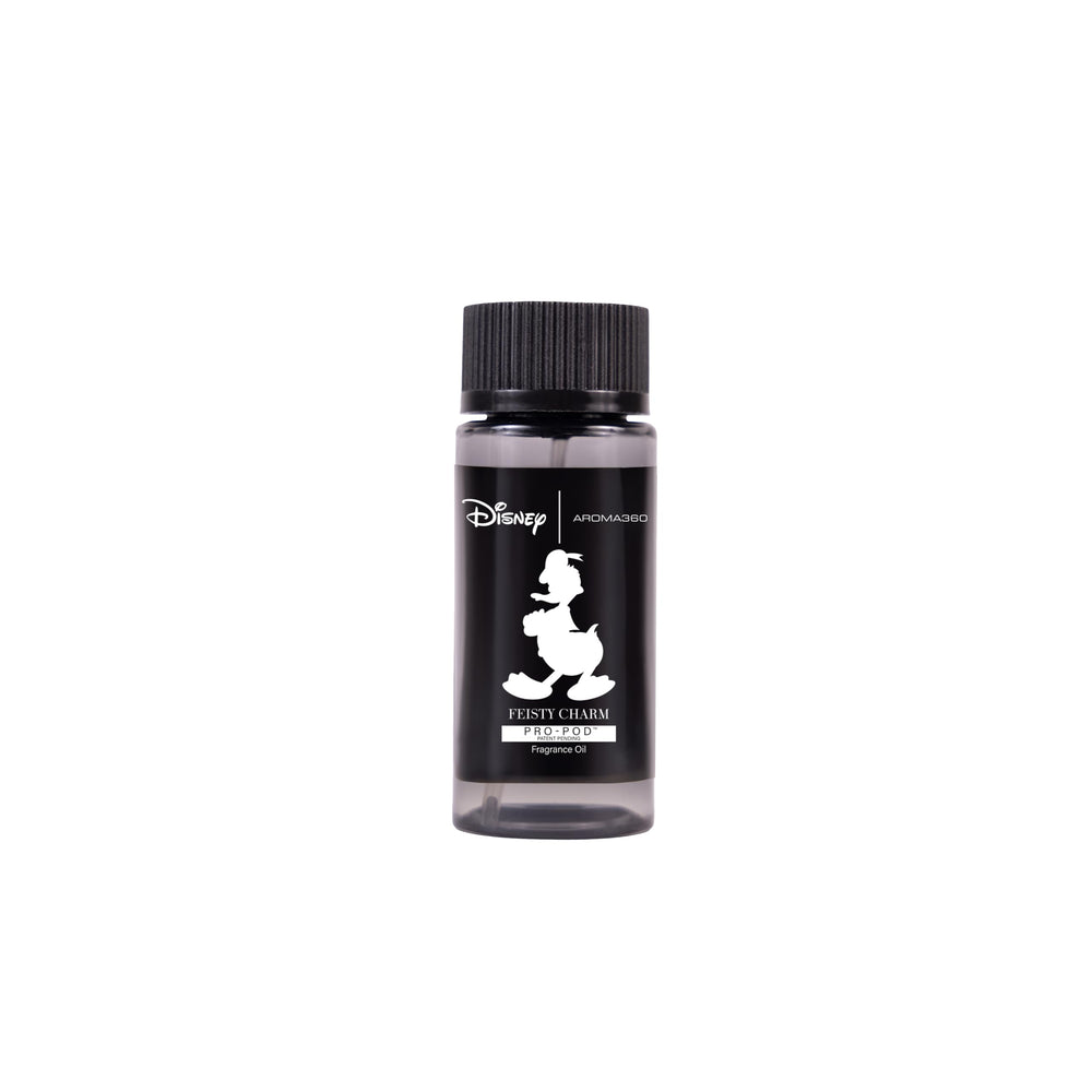 Aroma360 Disney Feisty Charm Pro-Pod bottle displayed beside a diffuser, ideal for cozy living rooms.