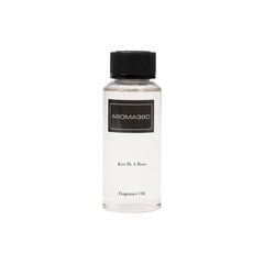 Aroma360 Kiss by a Rose 120ml bottle enhances room ambiance with a luxurious fragrance for diffusers.
