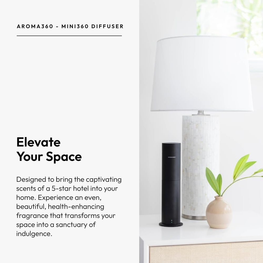 Aroma360 Mini360 diffuser in a home office setting for calm work ambience.