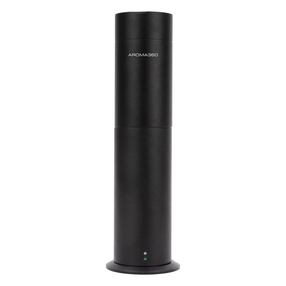 Aroma360 Mini360 diffuser in a hotel-inspired setup delivering luxurious fragrance for living spaces.