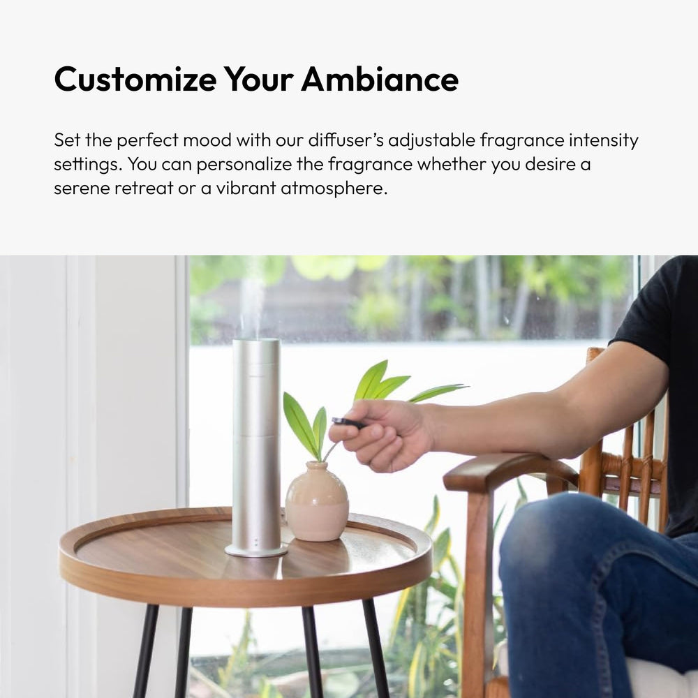 Aroma360 Mini360 diffuser with sleek black design enhances modern decor.
