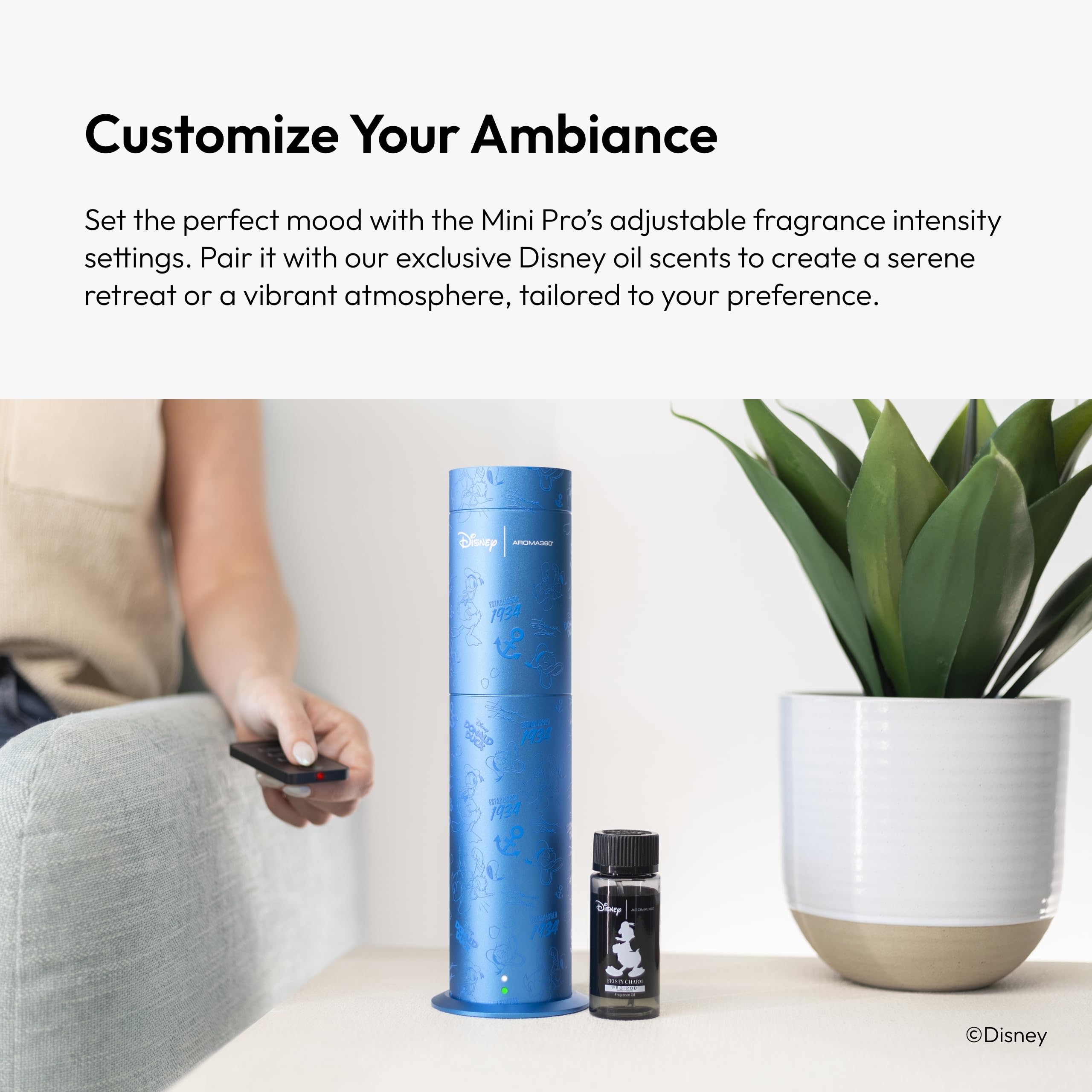 Aroma360 Pro Pod bottle inserted into the diffuser, showcasing compatibility.