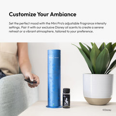 Aroma360 Pro Pod bottle inserted into the diffuser, showcasing compatibility.