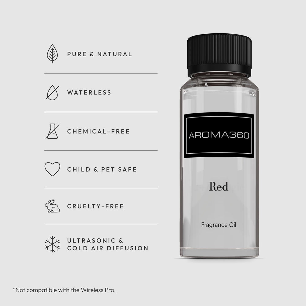 Aroma360 Red Diffuser Oil reed diffuser setup with elegant glass for continuous scent.