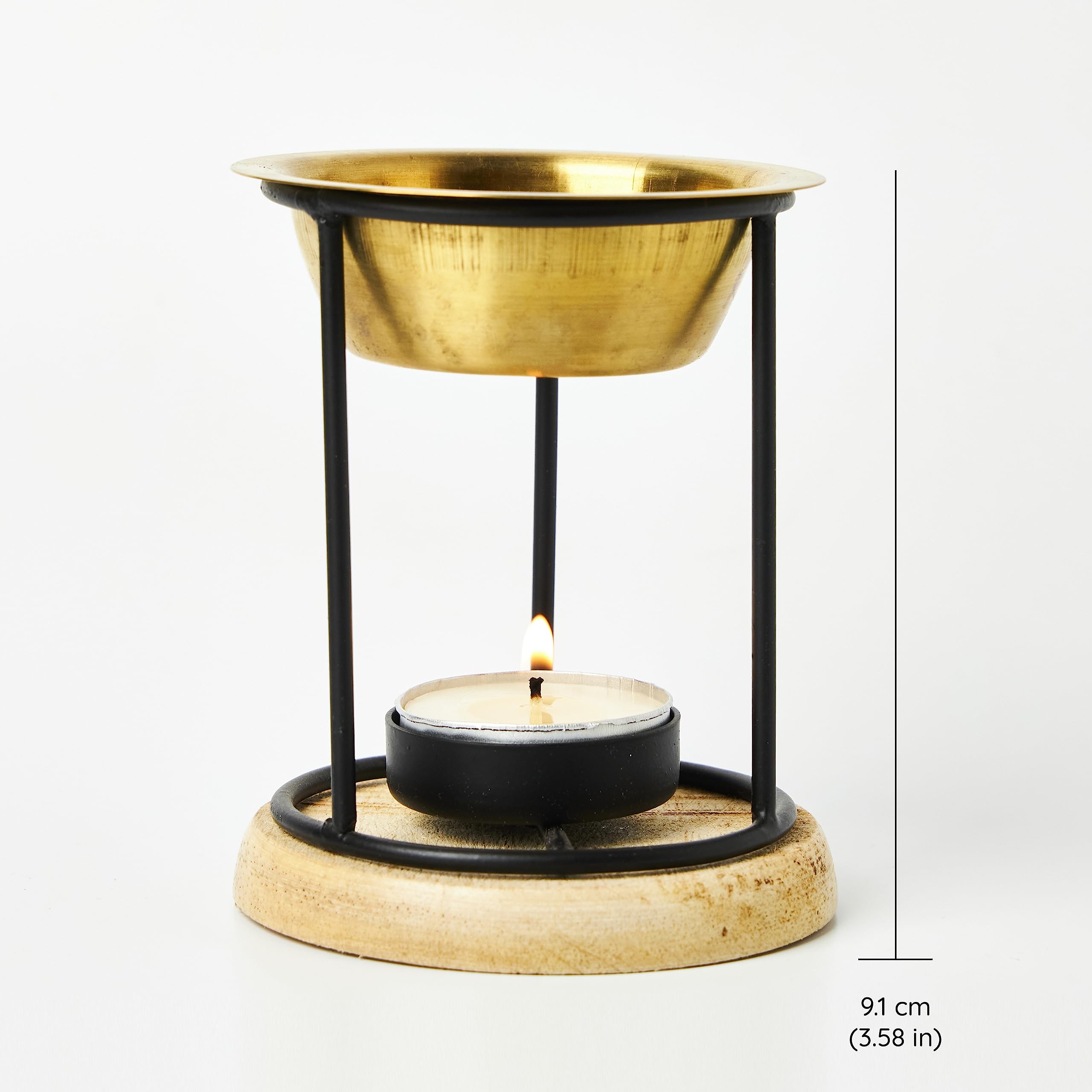 Aromafume Exotic Oil Burner glows softly, creating a calm, inviting atmosphere.