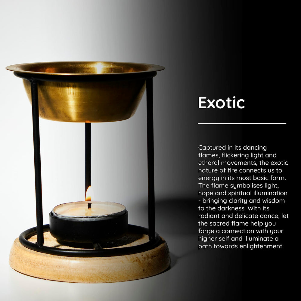 Aromafume Exotic Oil Burner on wooden coaster adds cozy space fragrance.