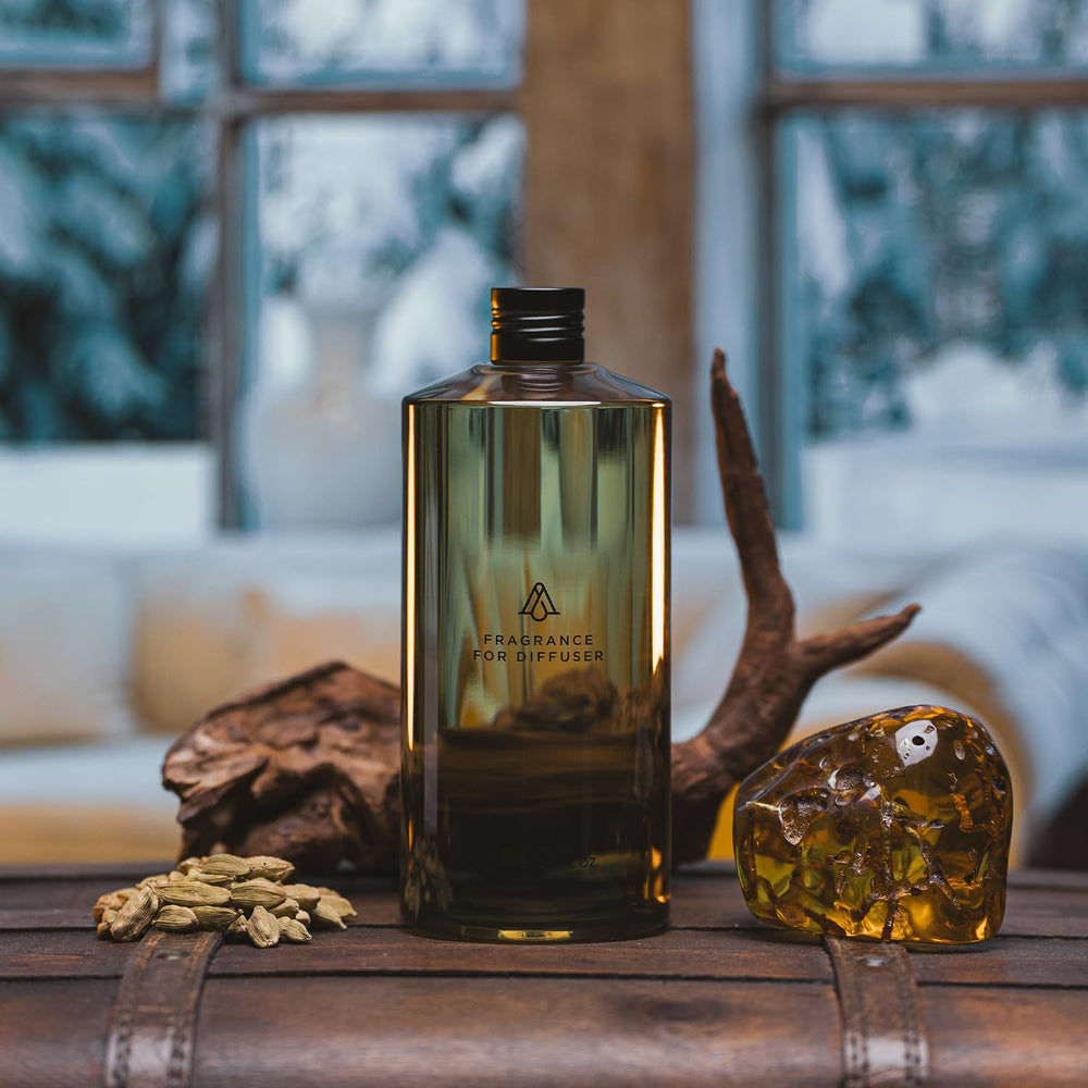 AROMAPLAN Spiced Amber diffuser in a hotel lobby setting