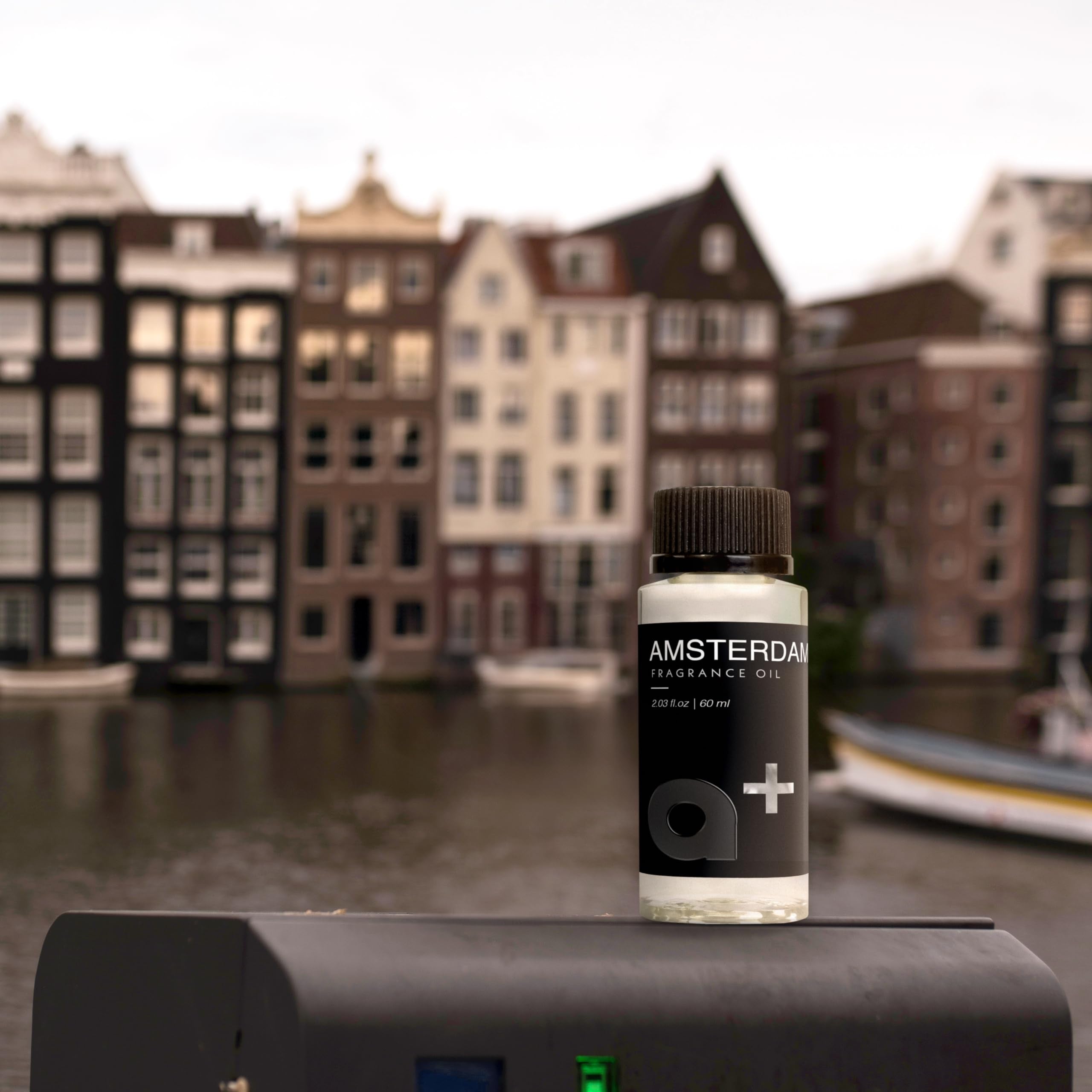 Aromar+ Amsterdam diffuser ambiance bottle creates an elegant scent for large spaces and HVAC diffusion.