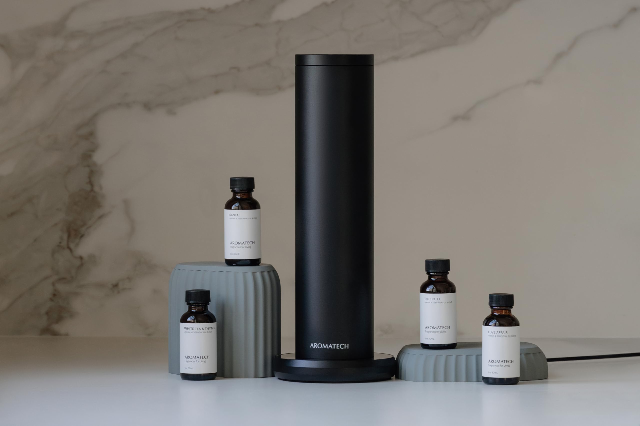 AroMini BT Plus living room scene demonstrates wide diffusion