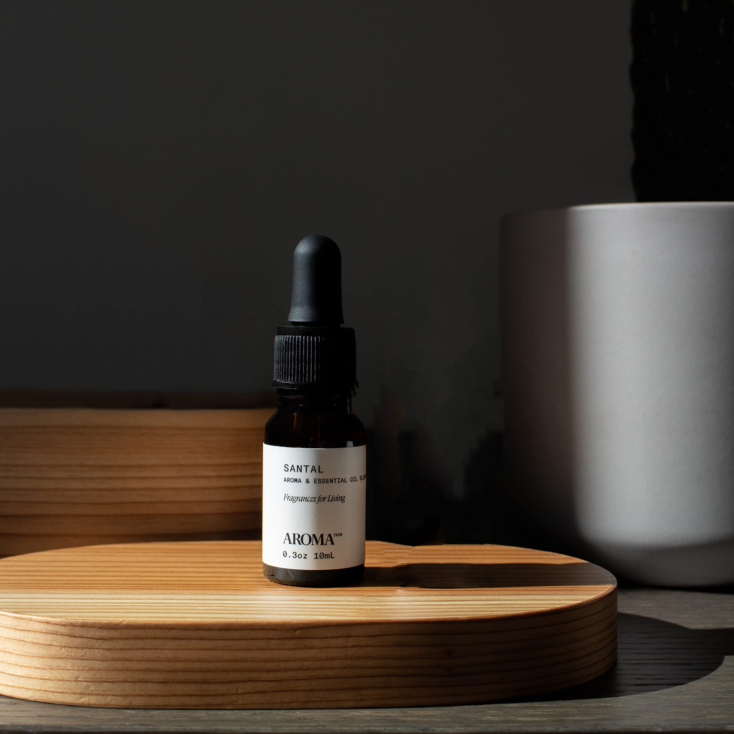 AromaTech diffuser setup shows bottle-to-diffuser use for quick room refresh.