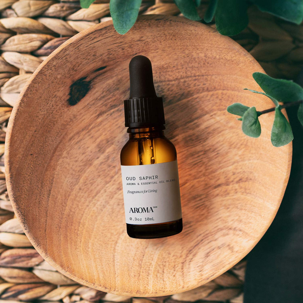 AromaTech Oud Saphir premium blend on a bedside table for a relaxing atmosphere