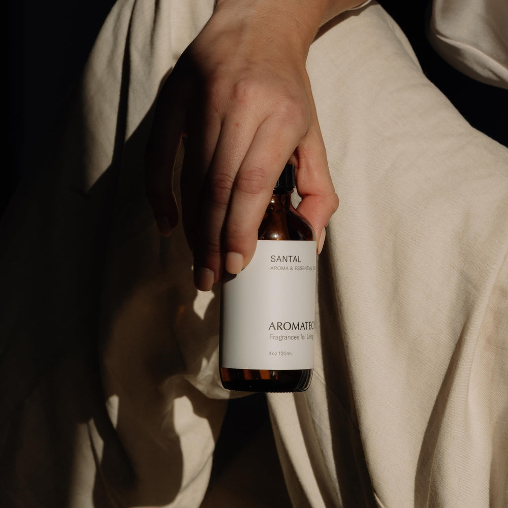 AromaTech Santal room diffusion fills a space with sandalwood and cedar warmth.