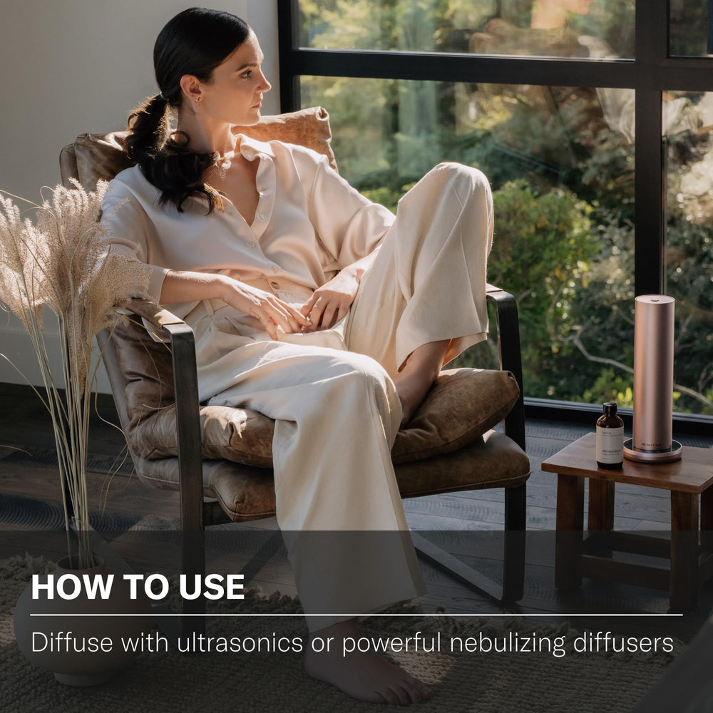 Soft-lit room featuring Aromatech White Tea & Thyme for tranquil study atmosphere