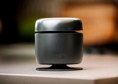 AromaTherapist AromaAmplifier uses AromaPucks for mess-free aromatherapy without water.